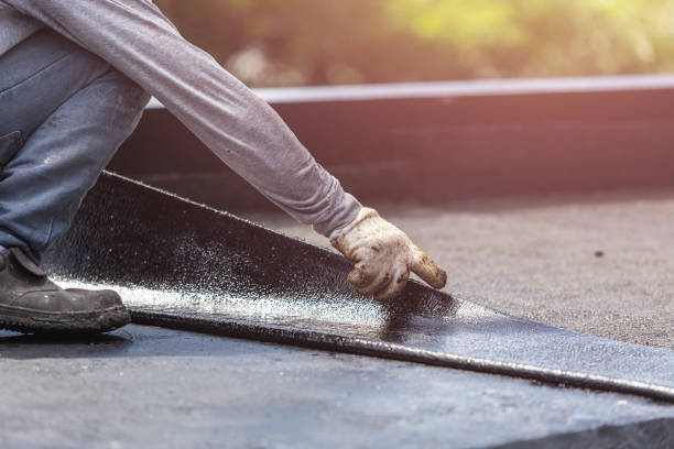 Professional Waterproofing technician working in Carrollton, KY
